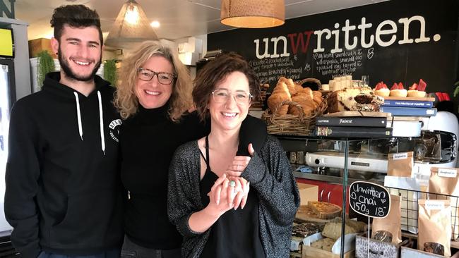 At Unwritten Bookshop Cafe, Jack Rumore with owners Georgina Rumore and her daughter Leah Rumore-Cwikel.