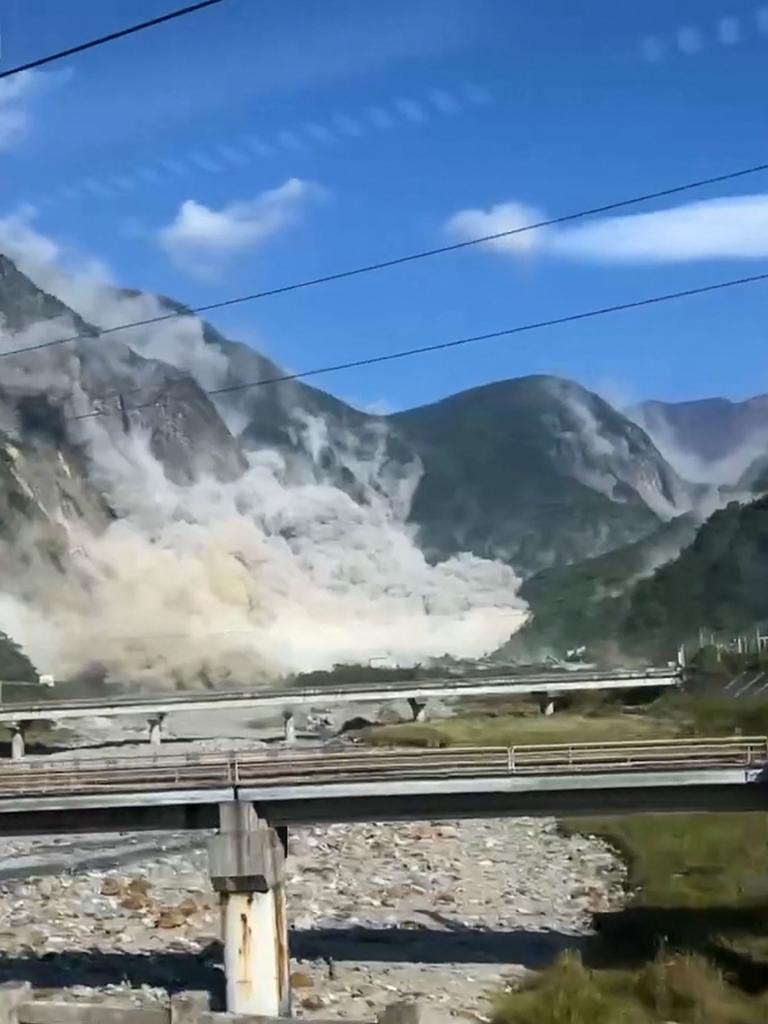 This screengrab taken from video footage shows rockfall from a mountain near Kanan bridge in Hualien county after a major earthquake hit Taiwan's east. Picture: AFP