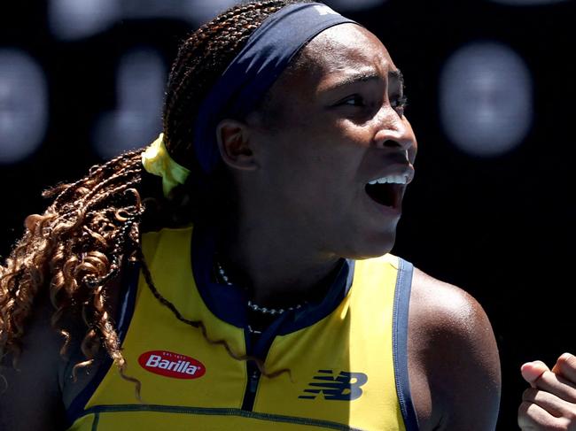 USA's Coco Gauff celebrates match point against Slovakia's Anna Karolina Schmiedlova during their women's singles match on day two of the Australian Open tennis tournament in Melbourne on January 15, 2024. (Photo by David GRAY / AFP) / -- IMAGE RESTRICTED TO EDITORIAL USE - STRICTLY NO COMMERCIAL USE --