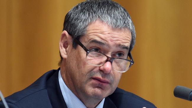 Agents carried away numerous documents from Senator Stephen Conroy’s office. Picture: AAP