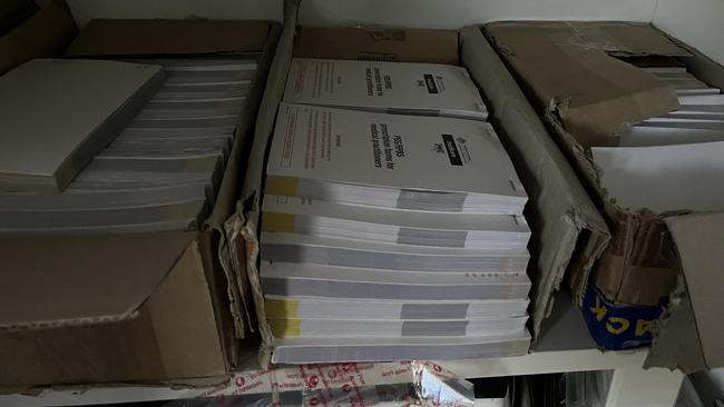 Prescription pads stored near the communal kitchen.