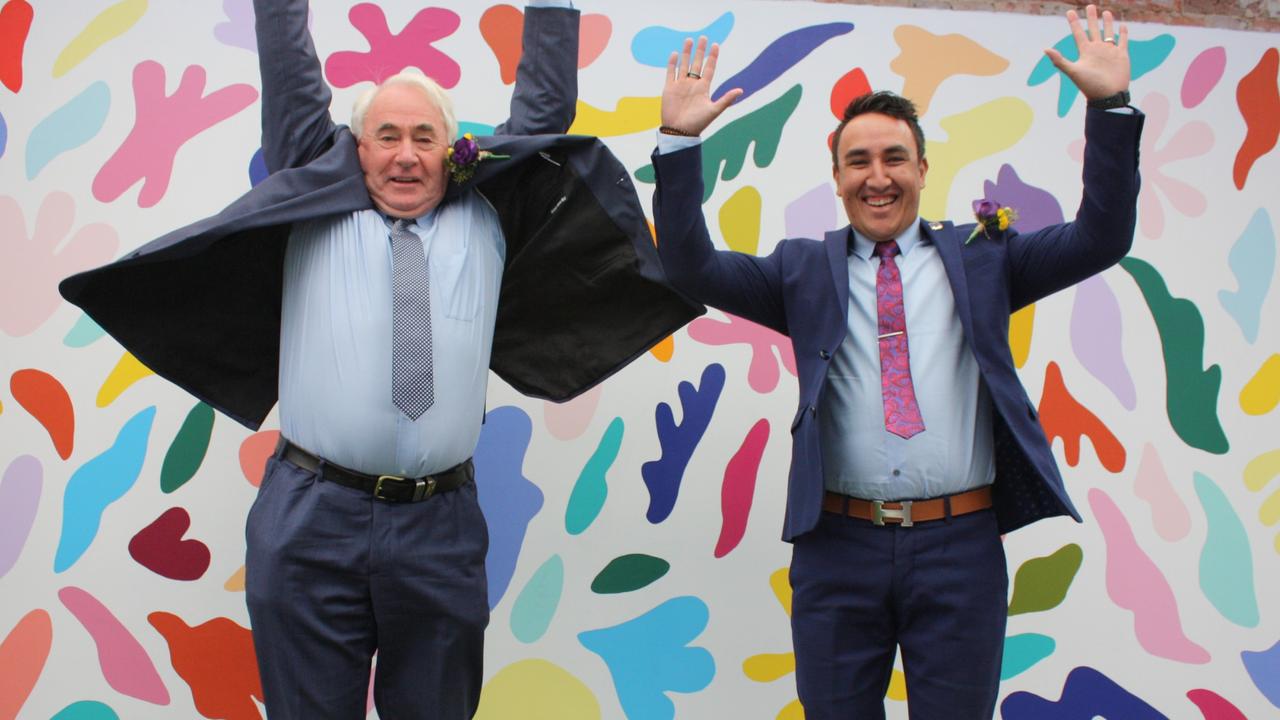 JUMPING FOR JOY: Toowoomba Regional Council Mayor Paul Antonio and Toowoomba Regional Council Environment and Community Services Committee Councillor James O'Shea at the official Toowoomba Carnival of Flowers 2021 program reveal on Tuesday, April 20. Picture: Kate McCormack