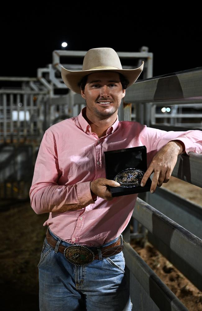 Giru cowboy Braydon Wellby with the buckle for the Open Bull Ride final event at the Mount Isa Mines Rodeo on Saturday. Picture: Dan Peled/Getty Images