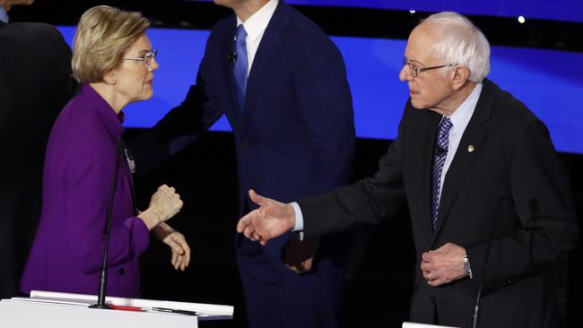 Elizabeth Warren appeared to refuse to shake Bernie Sanders’ hand after the heated Iowa debate. Picture: AP