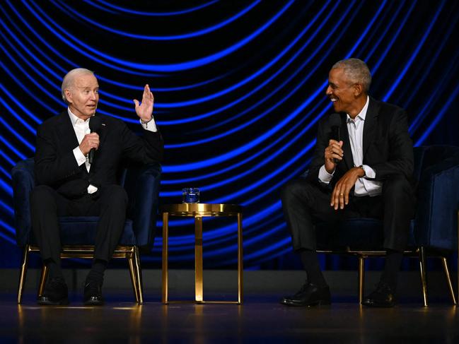 US President Joe Biden (L) speaks flanked by former US President Barack Obama onstage during a campaign fundraiser at the Peacock Theater in Los Angeles on June 15, 2024. (Photo by Mandel NGAN / AFP)