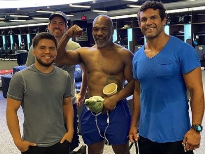 Mike Tyson trains with UFC champions Henry Cejudo and Vitor Belfort.