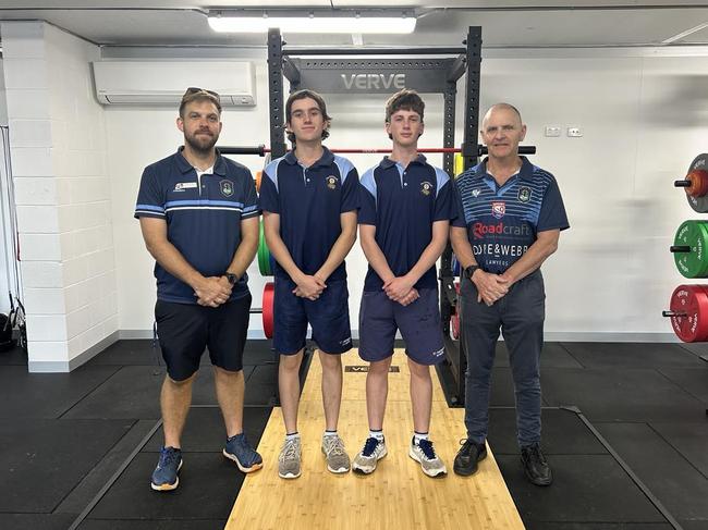 Todd Pooley (Leader of Learning - PE), Flynn Nolan (student), Ayden Mitchell (student) and Mark Newton (Principal) at the gym.