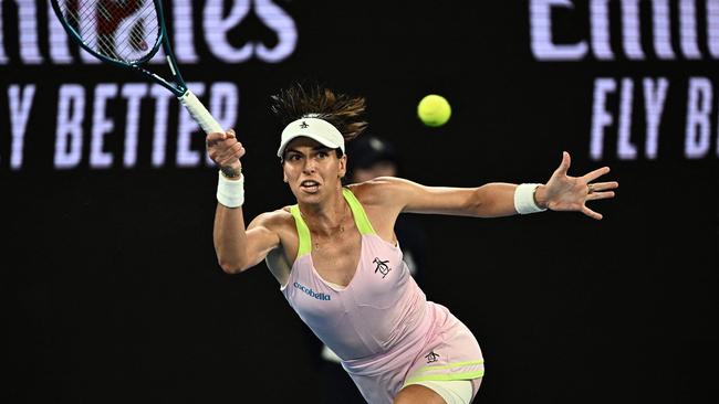 Australia's Ajla Tomljanovic hits a return against Croatia's Petra Martic. Picture: Lillian Suwanrumpha / AFP