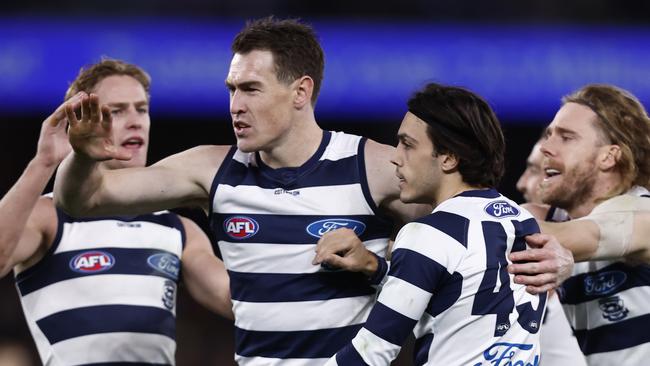 Jeremy Cameron and his Cats teammates celebrate a goal. Picture: Darrian Traynor/Getty Images