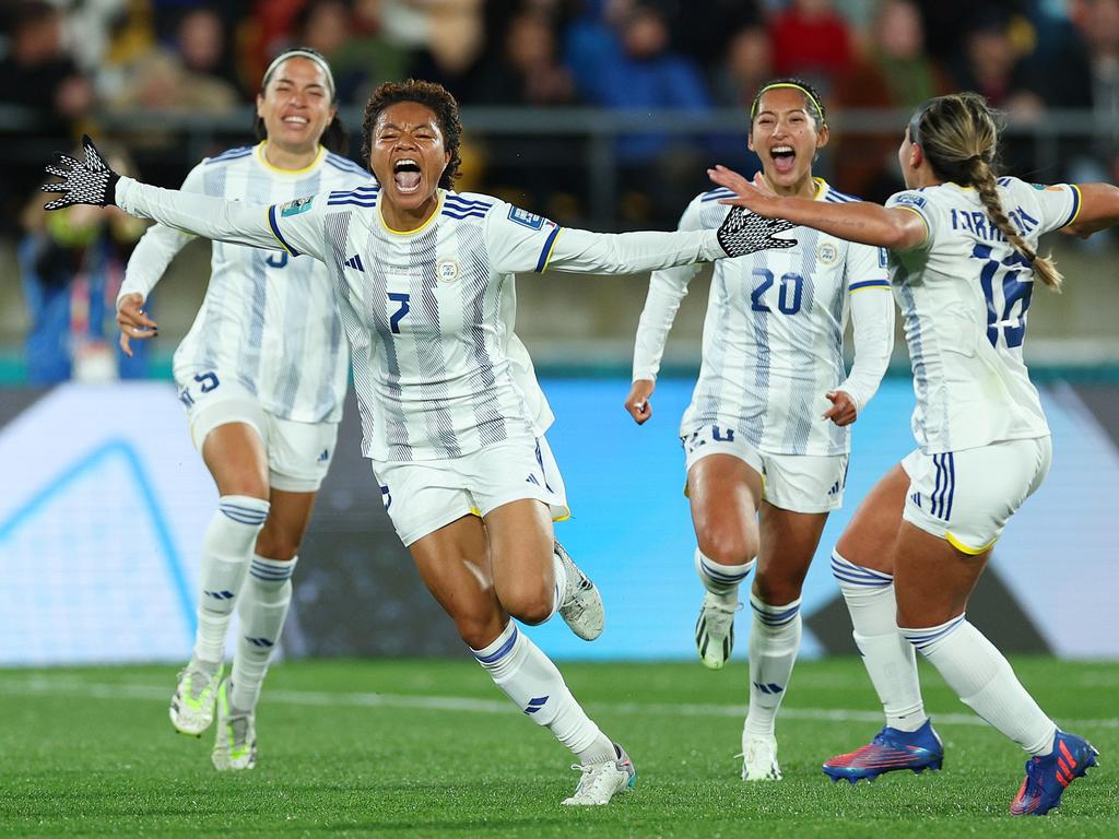 Philippines Joy: Sarina Bolden (second left) celebrates with teammates after scoring her team's first goal against New Zealand. Picture: Hagen Hopkins/Getty Images