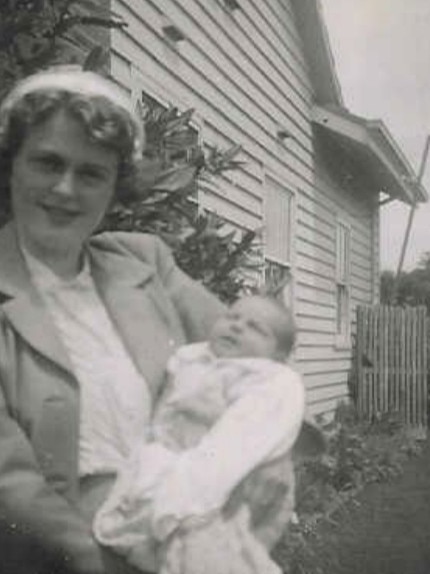 Bernard Salt as a baby cradled in the arms of his mother.