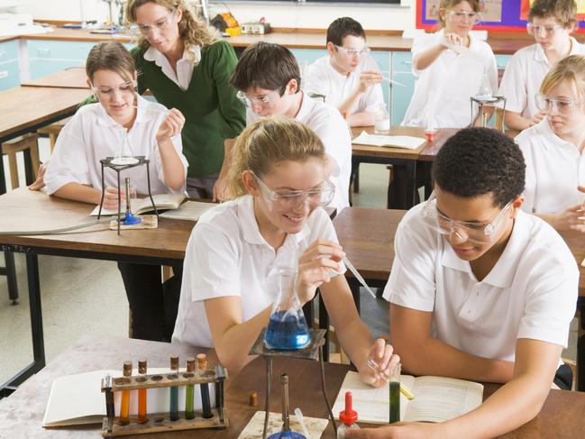 Generic stock image education Schoolchildren and Teacher in Science Class