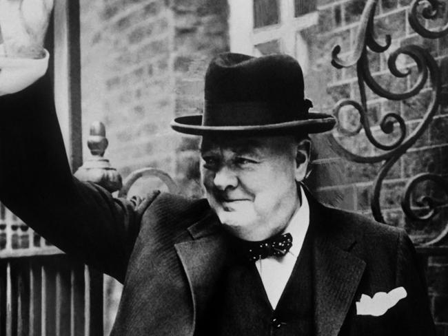 (FILES)  British Premier Sir Winston Churchill flashes to the crowd outside 10 Downing Street his famous V-sign signifying "Victory" when he returned to London in 1943 from one of his trips to Washington. (Photo by - / AFP)