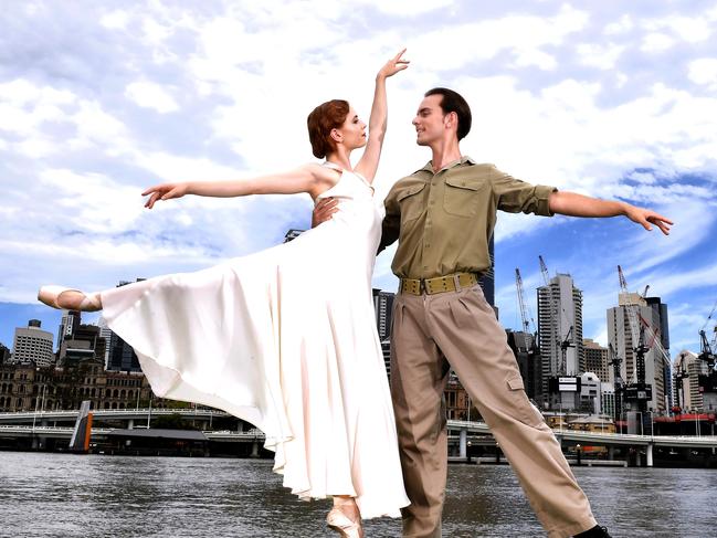 Dancers Mia Heathcote and Victor Estevez pose for a photograph with the city of Brisbane in the back ground for the 2021 season launch.Friday December 4, 2020. Picture, John Gass