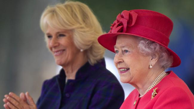 Camilla, Queen Consort, with Queen Elizabeth II, pictured here at the Ebony Horse Club in 2013. Picture: AFP.