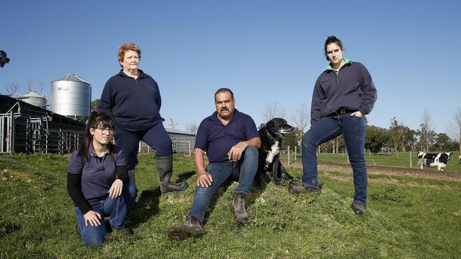 Vic and Debbie Guastella from Hallora are taking legal action against Ridley Corportation for stockfeed which was allegedly contaminated. They couple are pictured on their farm with daughters Emmah, 21, and Leesa, 15, and dog Max. Picture: Yuri Kouzmin