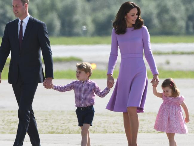 Britain's Prince William, Duke of Cambridge and his wife Kate, the Duchess of Cambridge, and their children Prince George and Princess Charlotte on the tarmac of the Airbus compound in Hamburg, northern Germany. Picture: AFP PHOTO / Patrik STOLLARZ