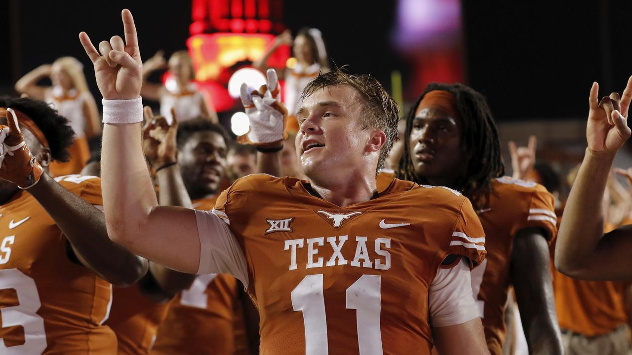 Texas quarterback Sam Ehlinger sings ‘The Eyes of Texas’ after a win. (Photo by Tim Warner/Getty Images)