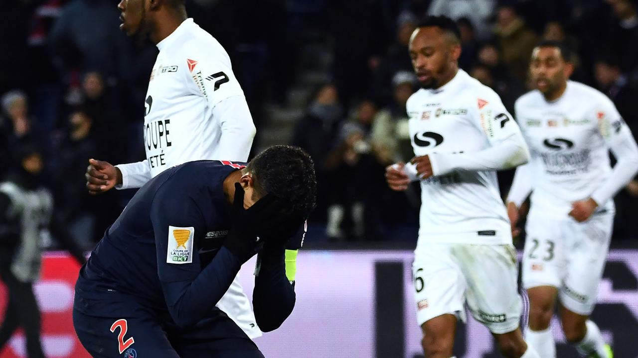 Paris Saint-Germain's Brazilian defender Thiago Silva (L) reacts during the French League Cup quarter-final