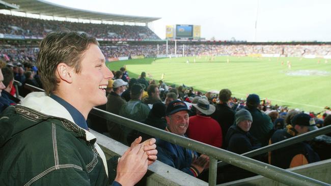 Laurence Angwin injured in the Football Park stands for the Crows’ 2001 home game against Hawthorn.