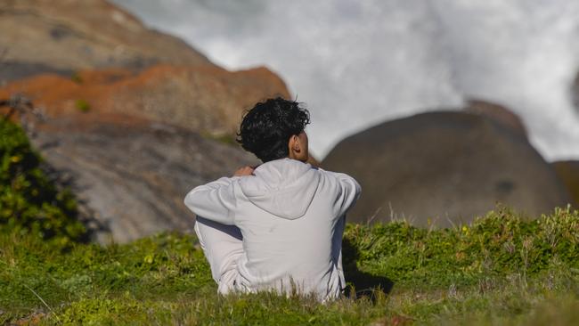 Sahil Habibi stares out at the ocean where his older brother was swept off the rocks. Picture: NewsWire / Roy VanDerVegt