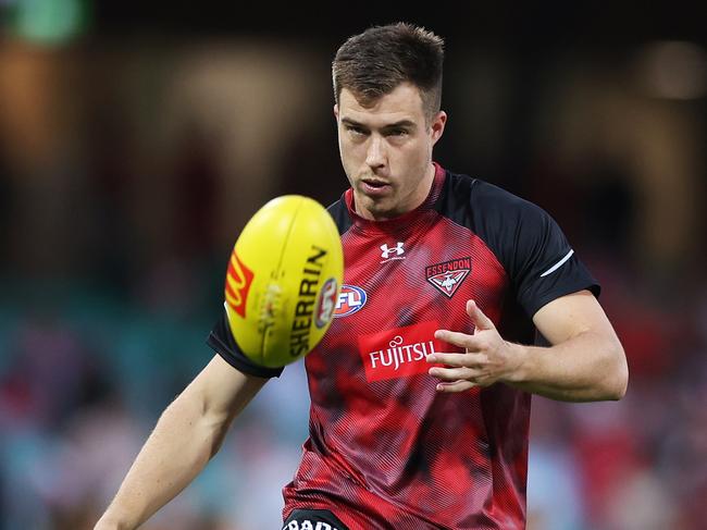 SYDNEY, AUSTRALIA - MARCH 23: Zach Merrett of the Bombers warms up during the round two AFL match between Sydney Swans and Essendon Bombers at SCG, on March 23, 2024, in Sydney, Australia. (Photo by Mark Metcalfe/AFL Photos/via Getty Images )