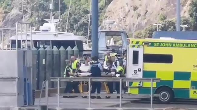 Injured people from the White Island Island volcanic explosion are ferried into waiting ambulances at Whakatane Wharf. Picture: New Zealand Herald/ NZME still from video by Katee Shanls