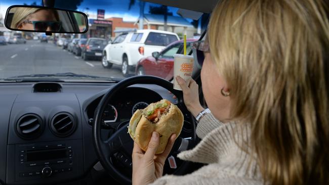 Eating and drinking was another common habit of Aussie drivers.