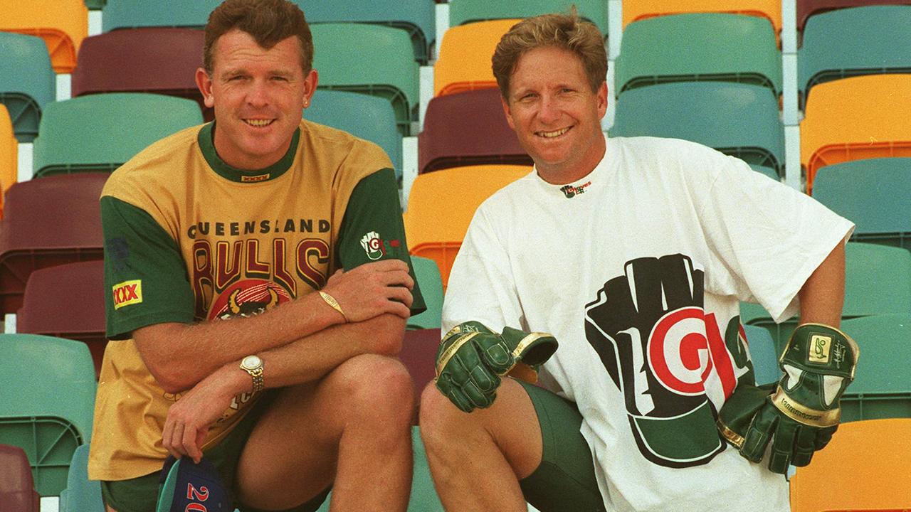 Craig McDermott (Queensland Bulls shirt) and Ian Healy.