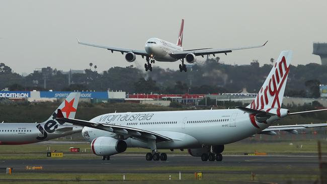 The skies over Sydney Airport will be monitored this week. Picture: Brendon Thorne