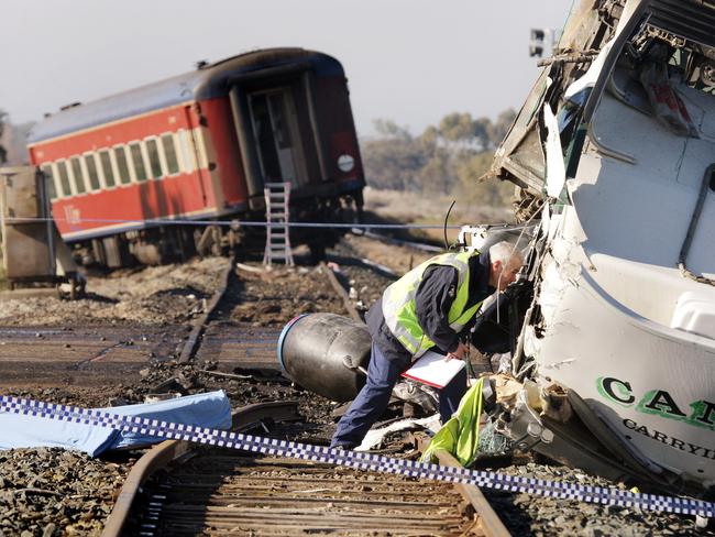 Emergency service workers on scene of the truck-train incident at Kerang.