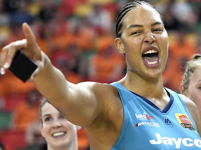 TOWNSVILLE, AUSTRALIA - DECEMBER 20: Elizabeth Cambage of the Flyers celebrates with team mates after their victory during the WNBL Grand Final match between the Southside Flyers and the Townsville Fire at the Townsville Stadium, on December 20, 2020, in Townsville, Australia. (Photo by Ian Hitchcock/Getty Images)