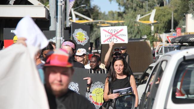 Marchers heading up down Gregory Tce, Alice Springs. Picture: Gera Kazakov