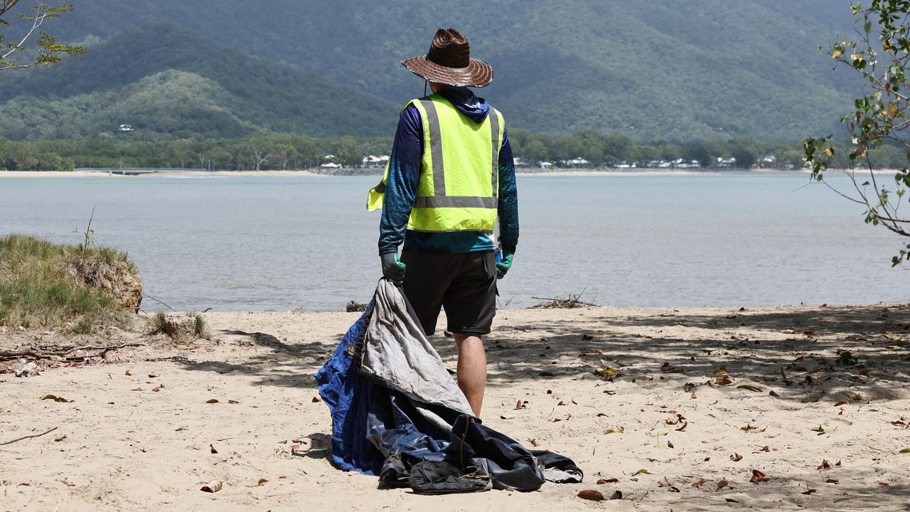 Businessman Audrius Macernis has purchased Taylor Point, the northmost parcel of land at Trinity Beach, for an undisclosed sum. The environmentalist plans to work with other conservation groups through his own organisation, the Macernis Group, to restore the 18ha site’s natural landscape. Taylor Point owner Audrius Macernis dismantles a tent that was set up on the headland by squatters. Picture: Brendan Radke