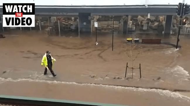 Water rushing down Toowoomba street