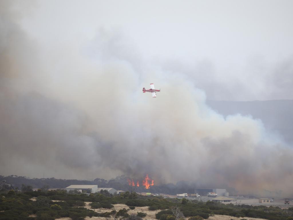 A plane over the Duck Ponds fire as it heads towards Port Lincoln. Picture: Robert Lang