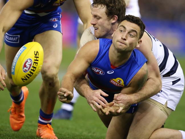 AFL Round 15. 29/06/2018. Western Bulldogs v Geelong at Etihad Stadium.  Western Bulldogs Luke Dahlhaus forth quarter action   . Pic: Michael Klein