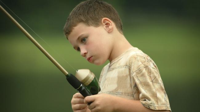 Boy fishing. Generic