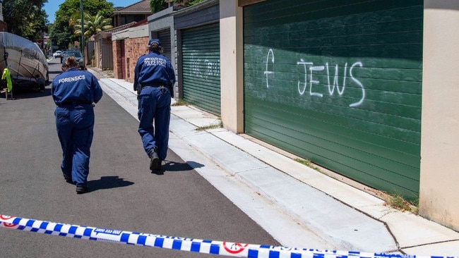 NSW police at the latest scene of anti-=Semitic graffiti, found in Kingsford. Picture: NewsWire/Simon Bullard.