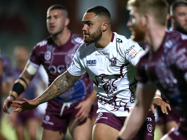 Dylan Walker warms up during a match between the Manly Sea Eagles and the Penrith Panthers in August. Picture: Jason McCawley/Getty Images