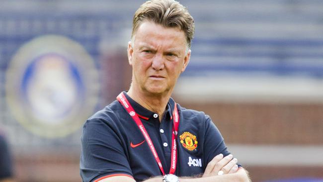 Manchester United manager Louis van Gaal watches his team during a training session, Friday, Aug. 1, 2014, at Michigan Stadium in Ann Arbor, Mich. Real Madrid will face Manchester United in a Guinness International Champions Cup match Saturday at this college football stadium. (AP Photo/Tony Ding)