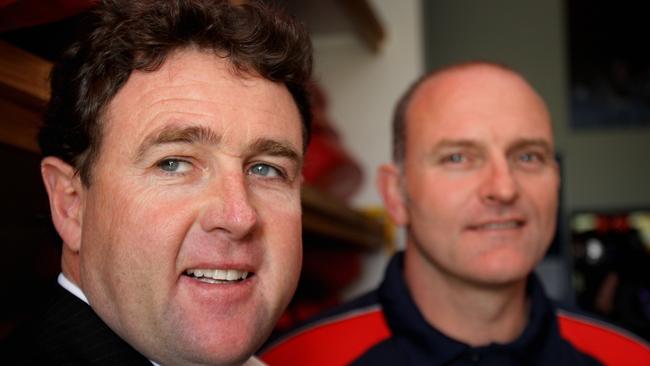 Melbourne footy manager Chris Connolly and former coach Dean Bailey were banned for acting in a manner “prejudicial to the integrity of the game”.