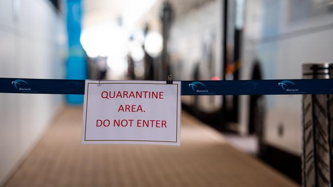 Passengers from two flights from Adelaide arriving at Darwin International Airport this morning, QF860 and JQ692, have been quarantined after the NT once again closed its borders to SA. Passengers were in the air when the decision was made, and were given the option to return to Adelaide or quarantine for two weeks in Howard Springs. Picture: Che Chorley