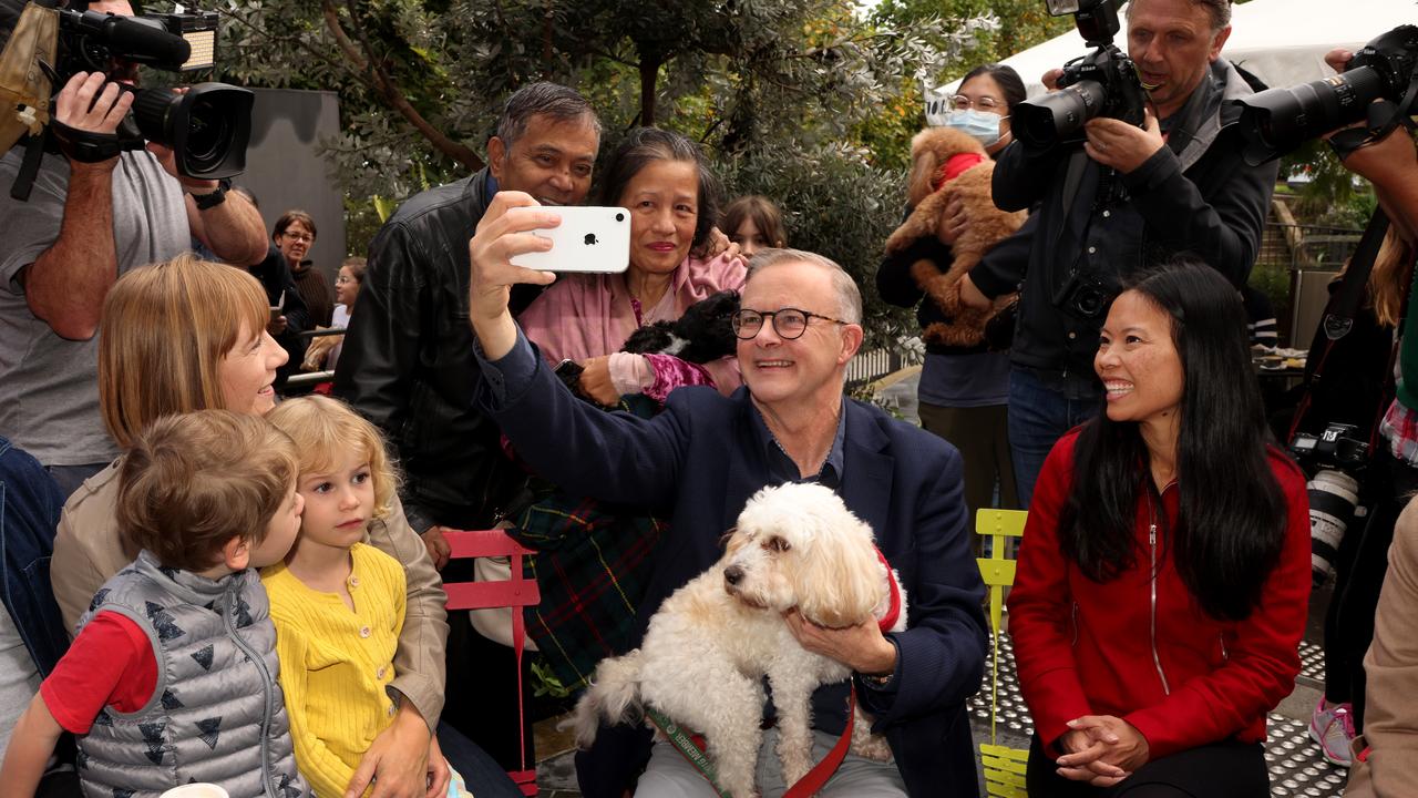 Albo has a coffee with his dog Toto, as well as Sally Sitou (right) and a group of friends and supporters. Picture: Chris Pavlich/The Australian