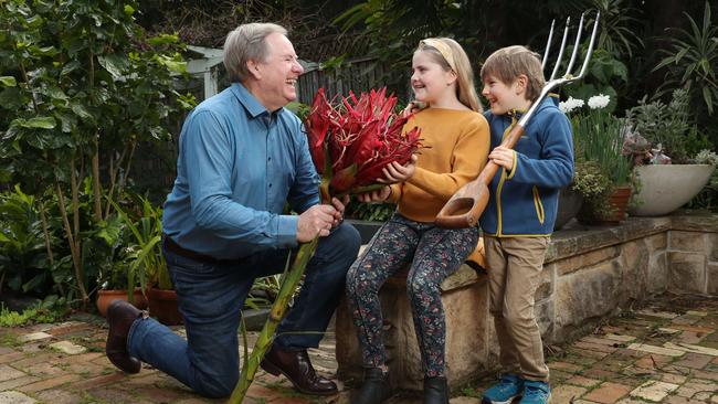 Celebrity gardener Graham Ross pictured at home with his grandchildren Flinders and Melaleuca. Picture: David Swift