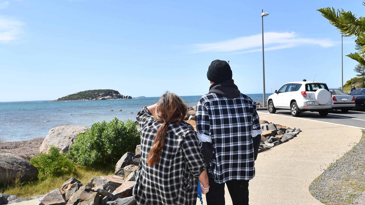 Ian Robinson awaits the return of his brother with partner Colleen Coulter at Victor Harbor. Picture: Keryn Stevens