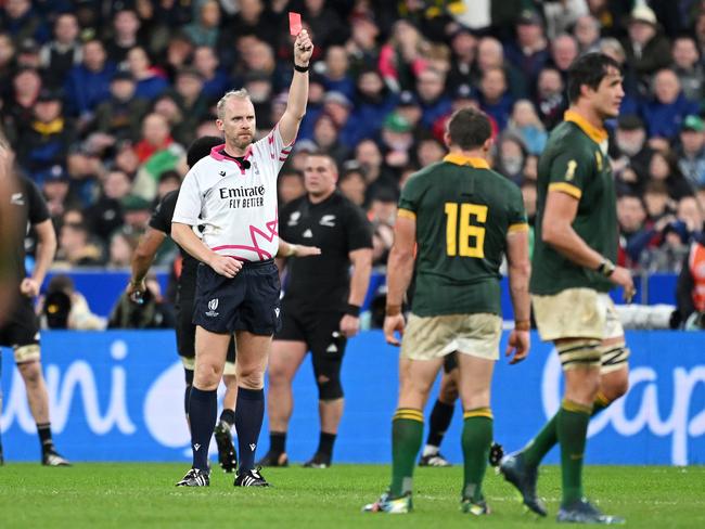 Referee Wayne Barnes upgrades Sam Cane of New Zealand's yellow card to a red card. Picture: Getty Images