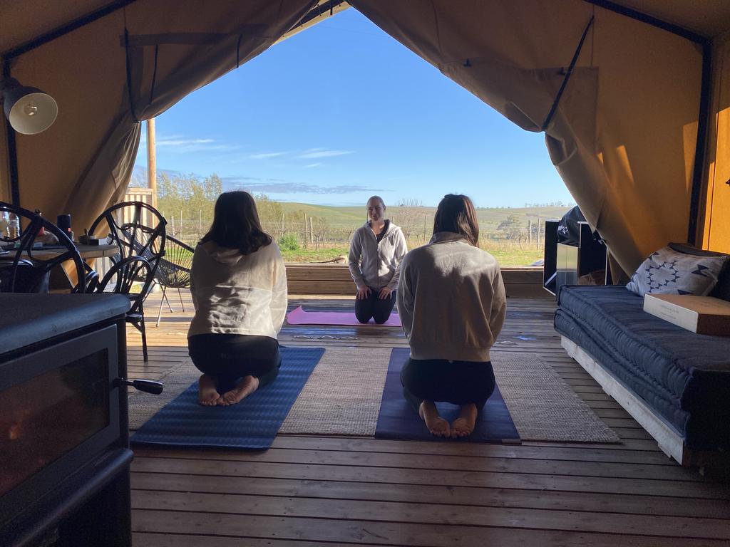 The glamping experience allows guests to book additional in-tent experiences, like yoga and massages.