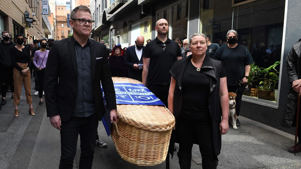 The Hospo Owners Collective, including Simone Douglas (front right), hold a funeral procession for the industry in November, 2021, walking through Peel St and Hindley St. Picture: Tricia Watkinson