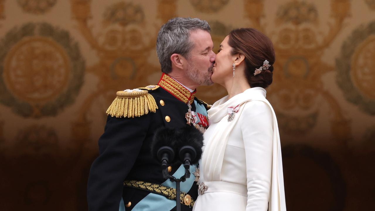 King Frederik X kisses his wife Queen Mary of Denmark after his proclamation by the Prime Minister. Picture: Sean Gallup